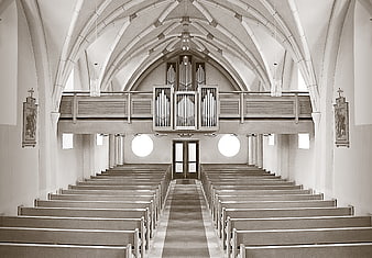Symmetrical Sepia Church Interior with Pipe Organ and Pews