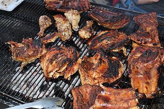 Grilled Chicken and Ribs on Charcoal Grill