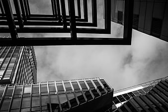 Black and White Modern Architecture Looking Up at Cloudy Sky