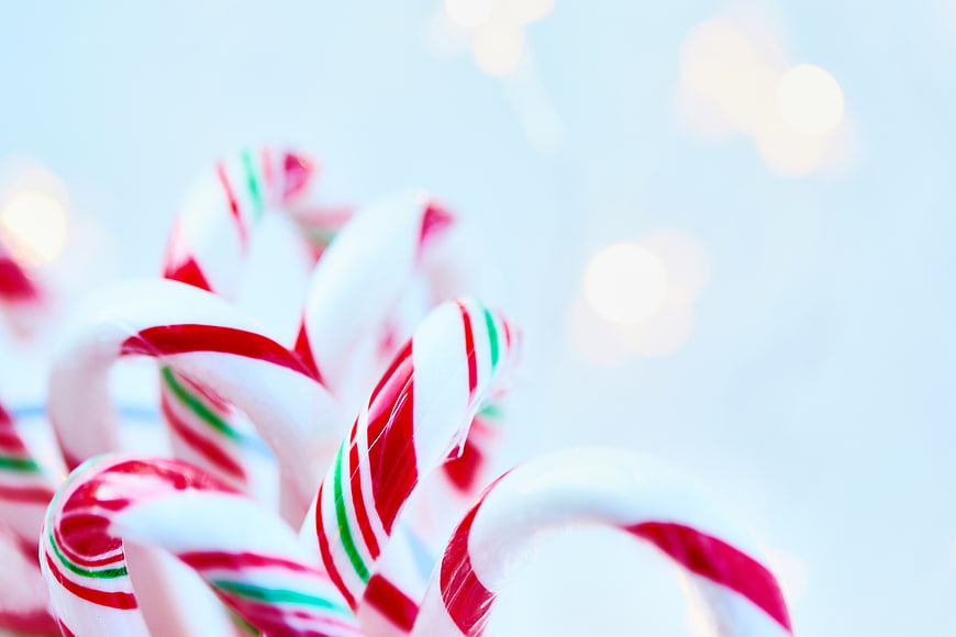 Close-up of Candy Canes with Bokeh Lights and Copyspace