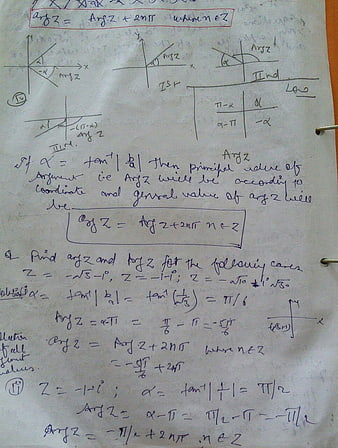Handwritten mathematics notes on complex number arguments
