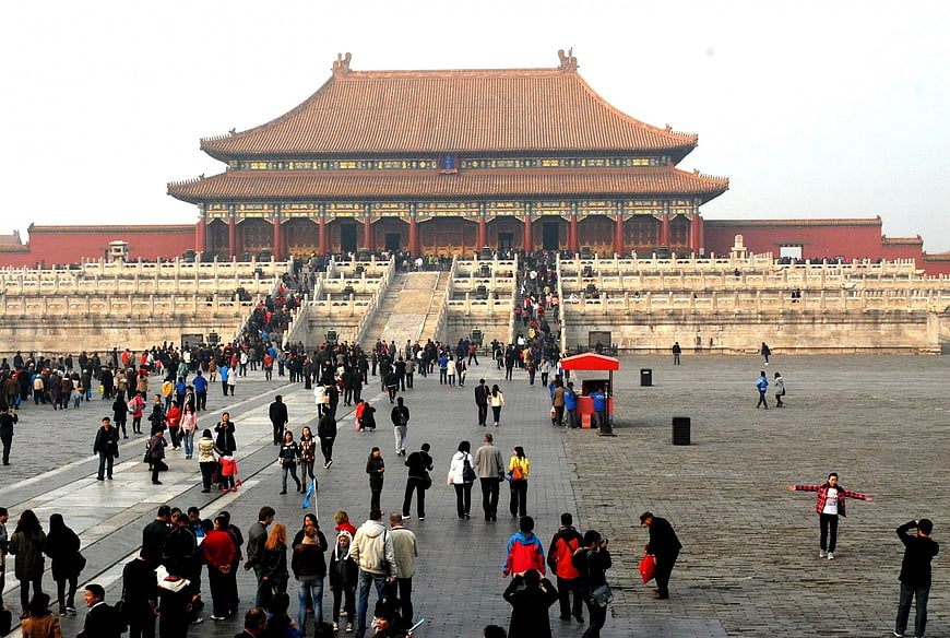 Tourists Walking In The Grand Courtyard Of The Forbidden City Beijing