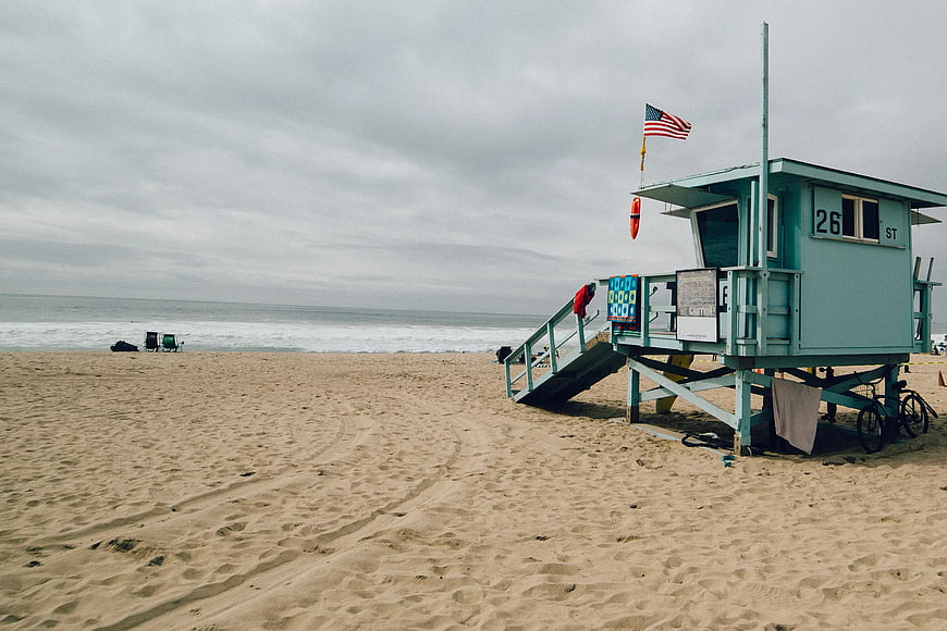 Mint Green Lifeguard Tower on Sandy Beach