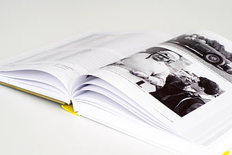Open book with vintage black and white photography