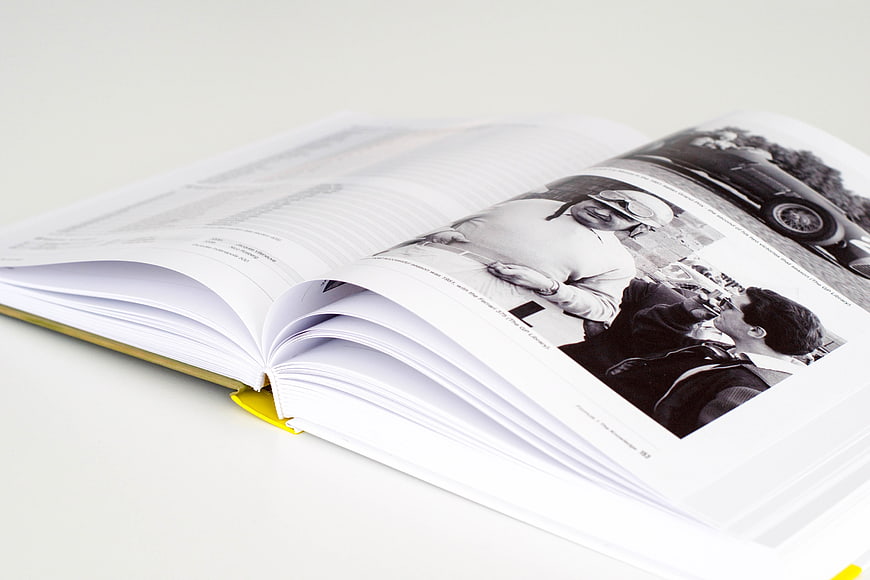 Open book with vintage black and white photography