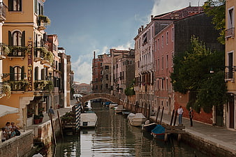 Venetian Canal Scene with Colorful Buildings and Bridge