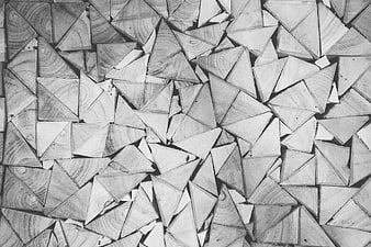 Black and white pattern of triangular wood pieces
