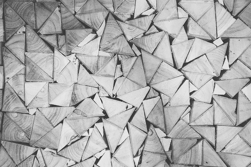 Black and white pattern of triangular wood pieces