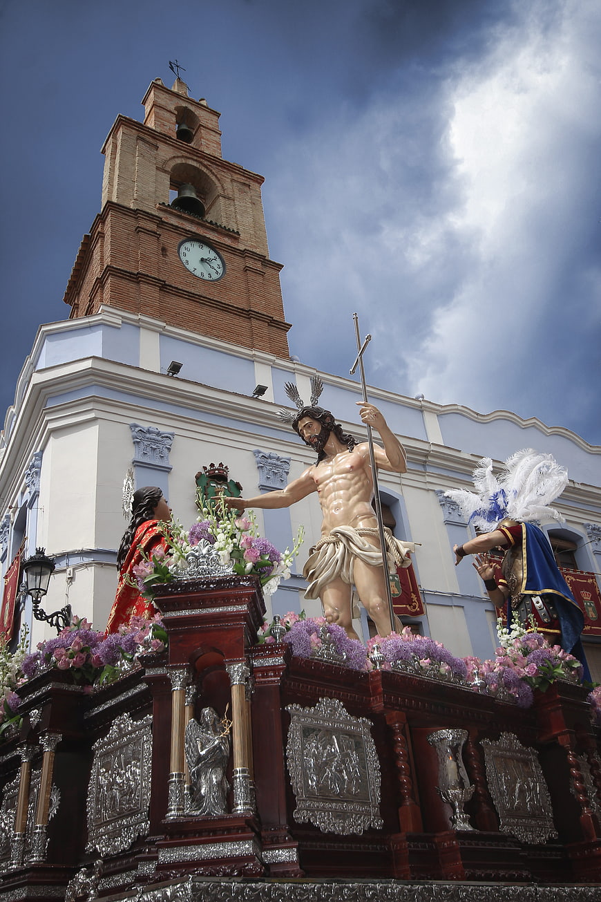 Risen Christ Statue on Easter Float in Spanish Town Square