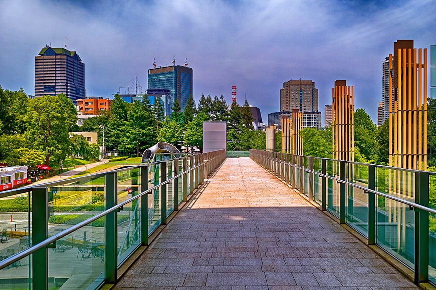 Modern Pedestrian Bridge Leading To Tokyo Roppongi City Skyline