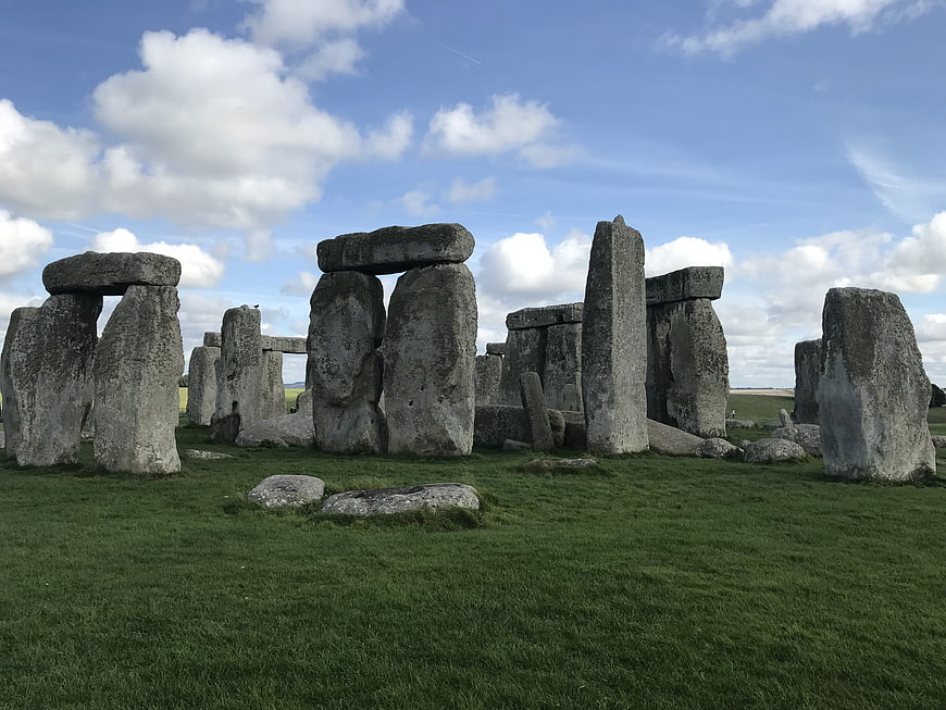 Stonehenge ancient stone circle monument on green grass