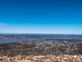 Panoramic View of City, River, and Bridge from Mountain Overlook