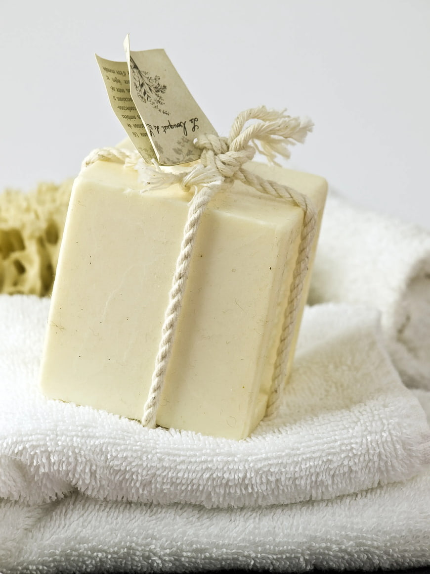 Handmade Soap Bar on White Towel