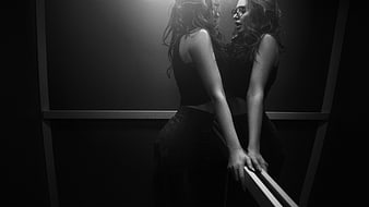 Black and White Portrait of Woman in Elevator