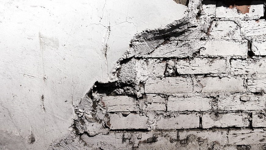 Textured White Brick Wall with Peeling Paint Background