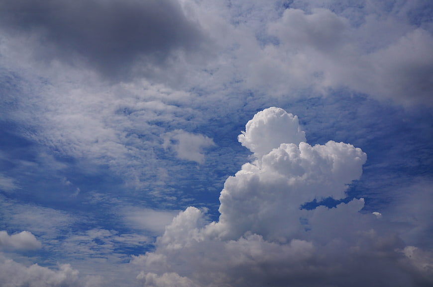 Dramatic Cumulus Cloud Formation Against Blue Sky