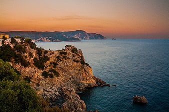 Scenic coastal cliff landscape at sunset with Mediterranean sea view