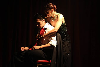 Dramatic Tango Dance Performance with Couple in Formal Wear