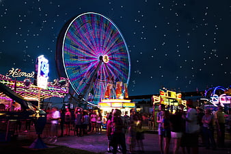 Colorful Ferris Wheel at Night Carnival Fairground