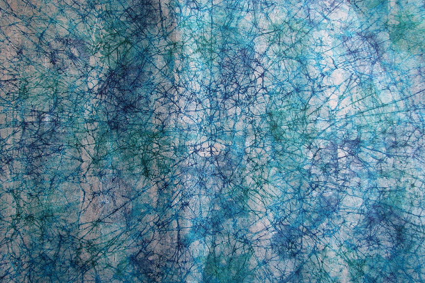 Abstract Blue and Green Tie-Dye Paper Texture Background