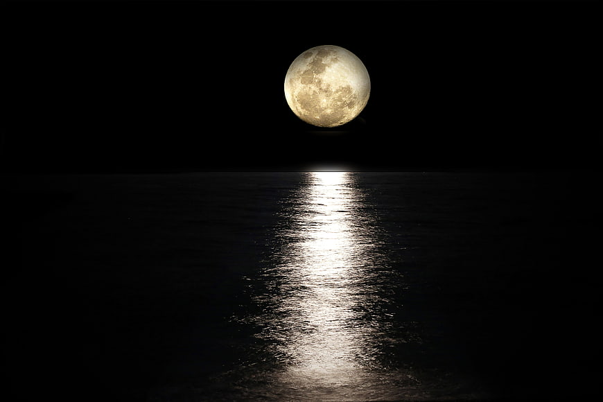 Full Moon Over Calm Sea with Reflection