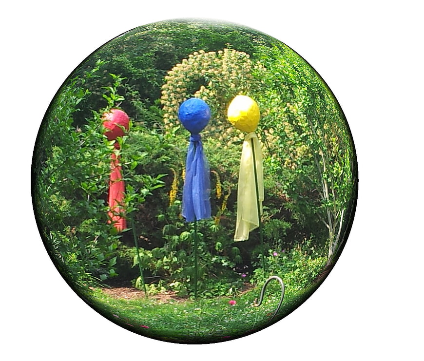 Colorful Garden Ornaments in a Lush Green Setting