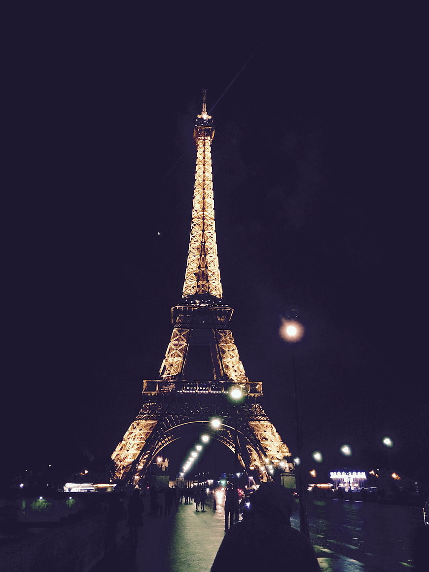 Eiffel Tower illuminated at night in Paris