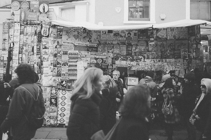 Black and White Street Scene with Vintage Posters