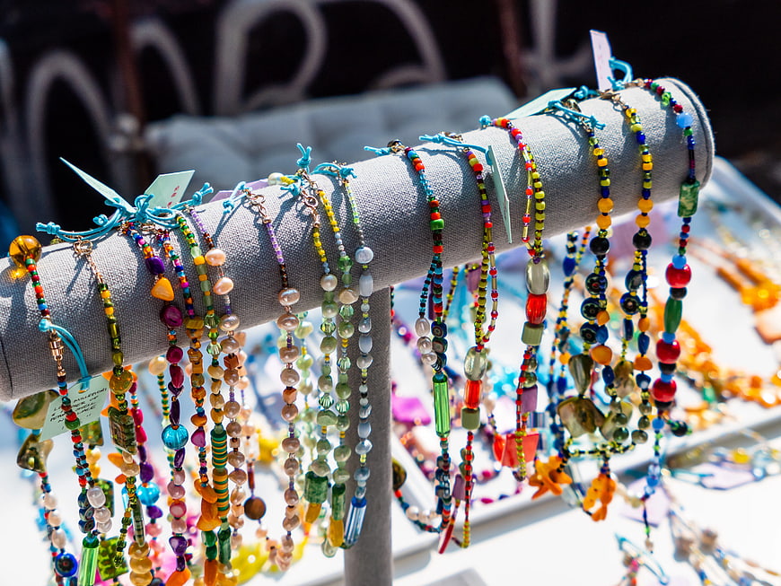 Colorful Handmade Beaded Bracelets on Display Stand