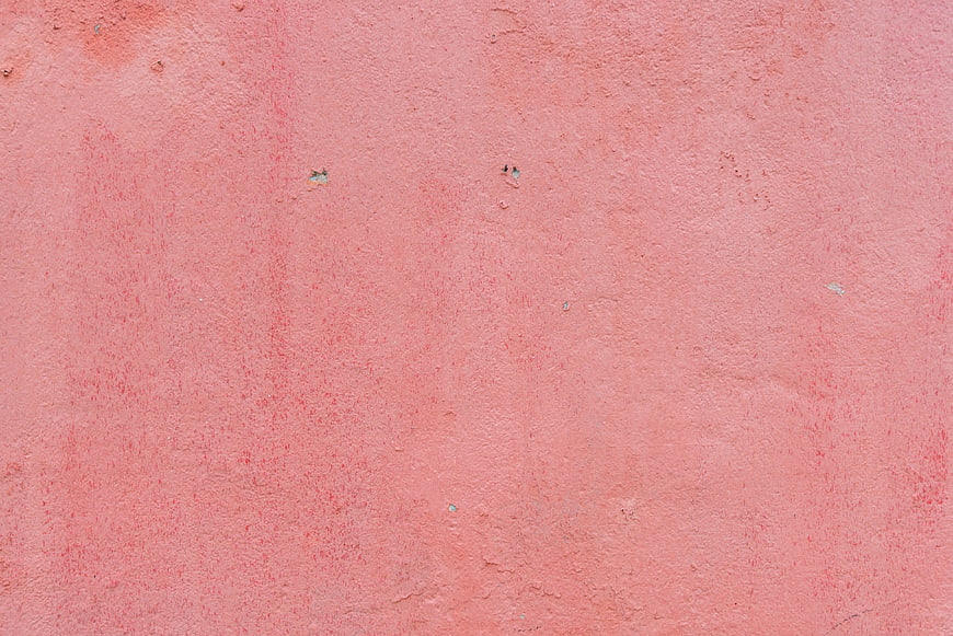 Textured Pink Plaster Wall Surface Background