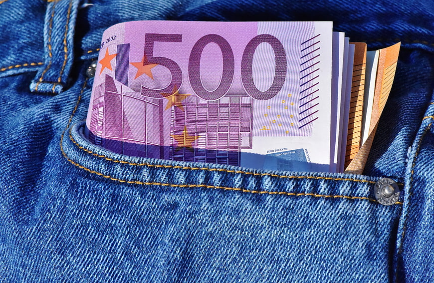 500 Euro Banknotes in Blue Denim Jeans Pocket