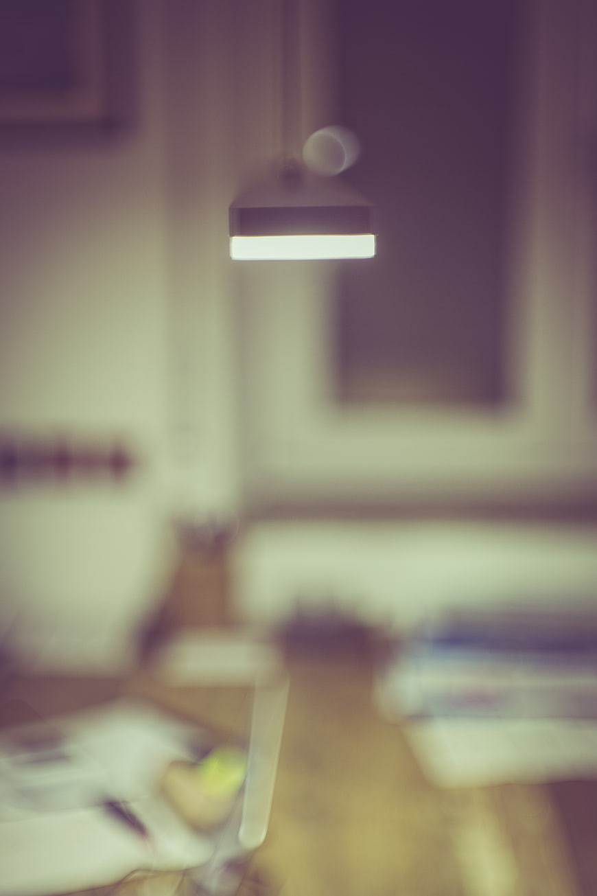 Blurred Abstract Interior with Hanging Lamp Light