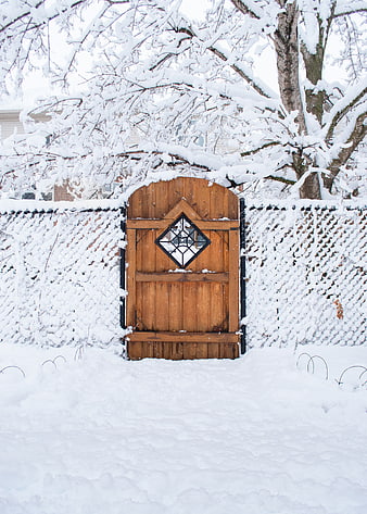 Snowy Wooden Garden Gate with Stained Glass Diamond