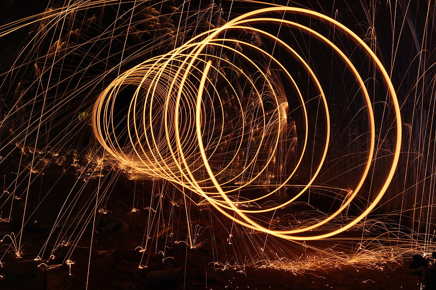 Steel wool fire spinning long exposure light painting art