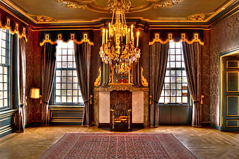 Luxurious Baroque Interior with Gold Chandelier and Fireplace
