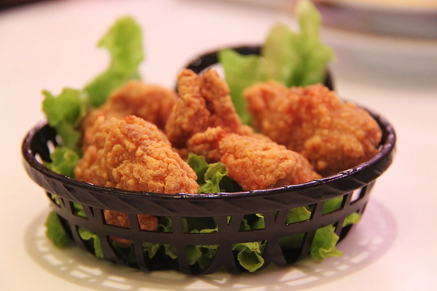 Crispy Fried Chicken Nuggets in Black Basket