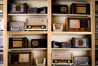 Vintage Retro Radios on Wooden Shelves Collection