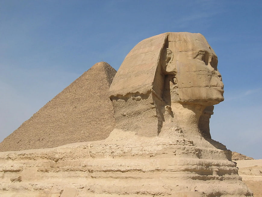 Great Sphinx of Giza with Pyramid Background in Egypt