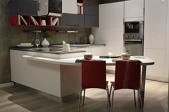 Modern Kitchen Interior with Red Chairs and Island