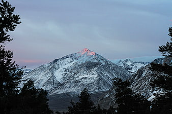 Snowy Mountain Peak with Alpenglow at Dusk