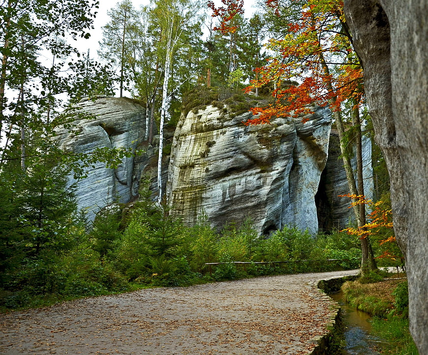 Autumn path winding through Andrsbach Rock City sandstone formations