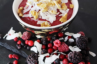 Healthy Berry Smoothie Bowl with Walnuts and Coconut Flakes
