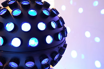 Close-up of black disco ball with blue LED lights