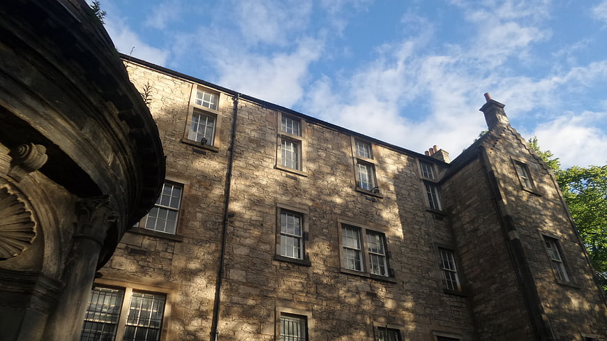 Low angle view of historic stone building facade