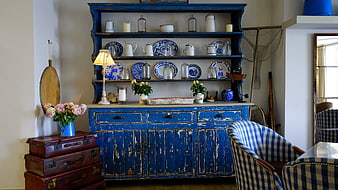 Vintage Blue Herringbone Cabinet with Decorative Dishes