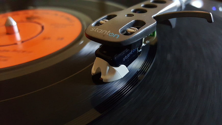 Close-up of a Stanton turntable stylus on a spinning vinyl record