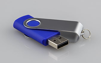 Blue and Silver Rotating USB Flash Drive on Gray Background