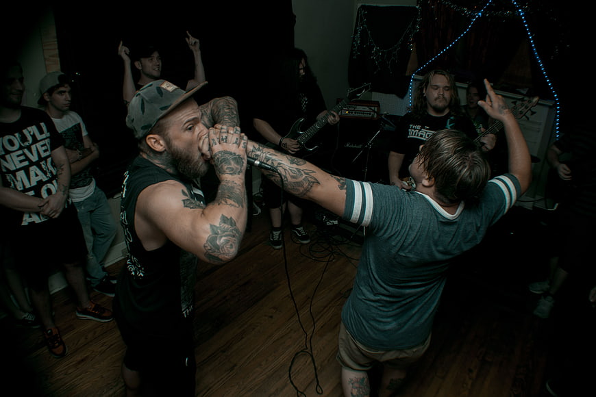 Energetic punk rock band performance in intimate venue