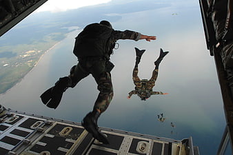 Special forces combat divers jumping from military aircraft