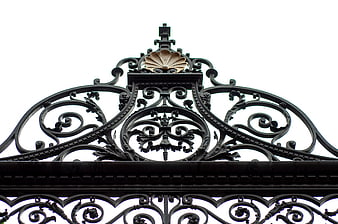 Ornate black wrought iron gate with gold shell detail